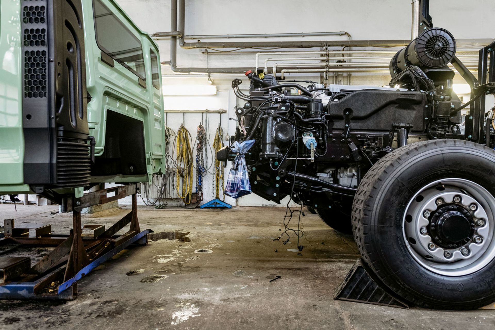 In the workshop – The truck's cab, chassis and superstructure are broken down into multiple parts.