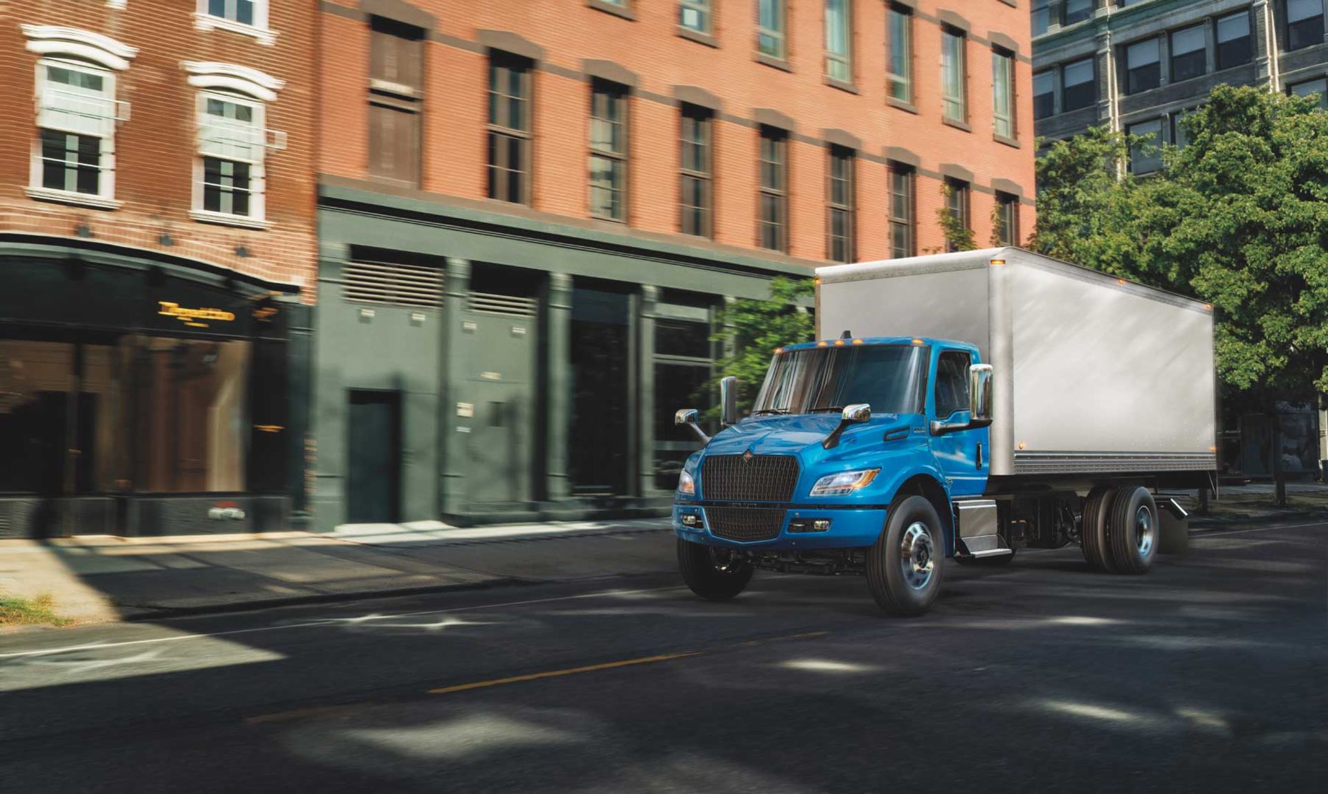 Image of a blue Navistar International eMV box truck