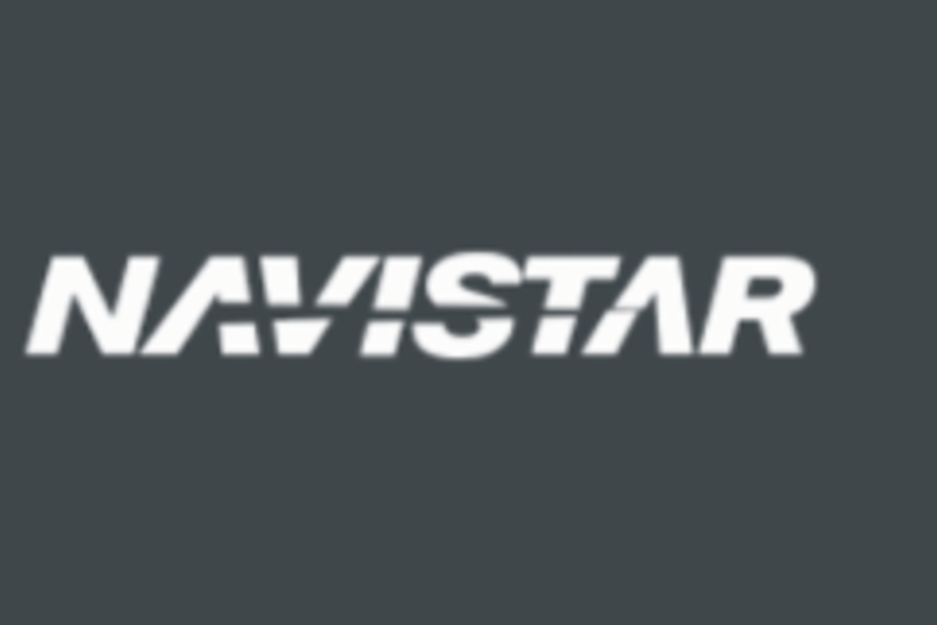 weißes Navistar-Logo vor dunkel grauem Hintergrund
                 