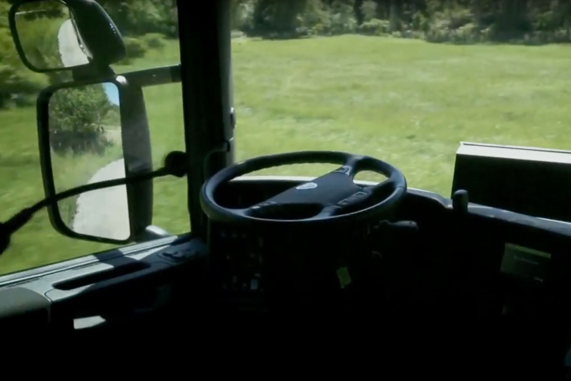 An automobile without a driver behind the wheel
                 