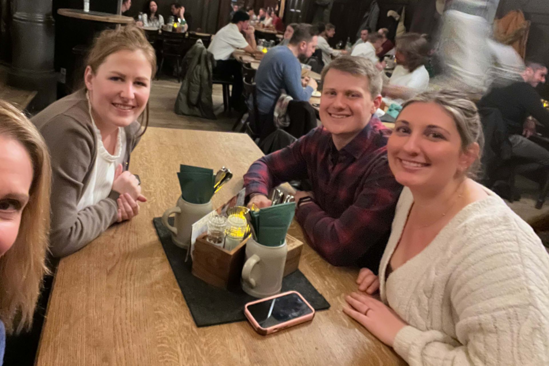 Brotzeit: Darcy and ex-pats Anna Reuter, Alyssa Powers, and Matt Murphy look forward to Bavarian cuisine.