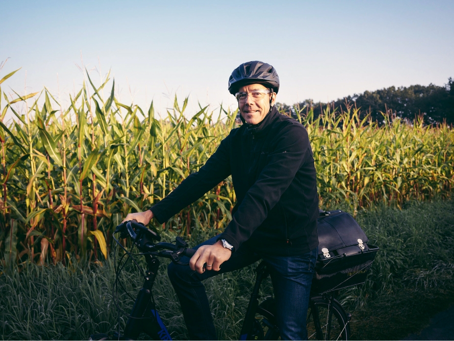 Managing Director Stephan Potthoff-Wenner on an e-bike.